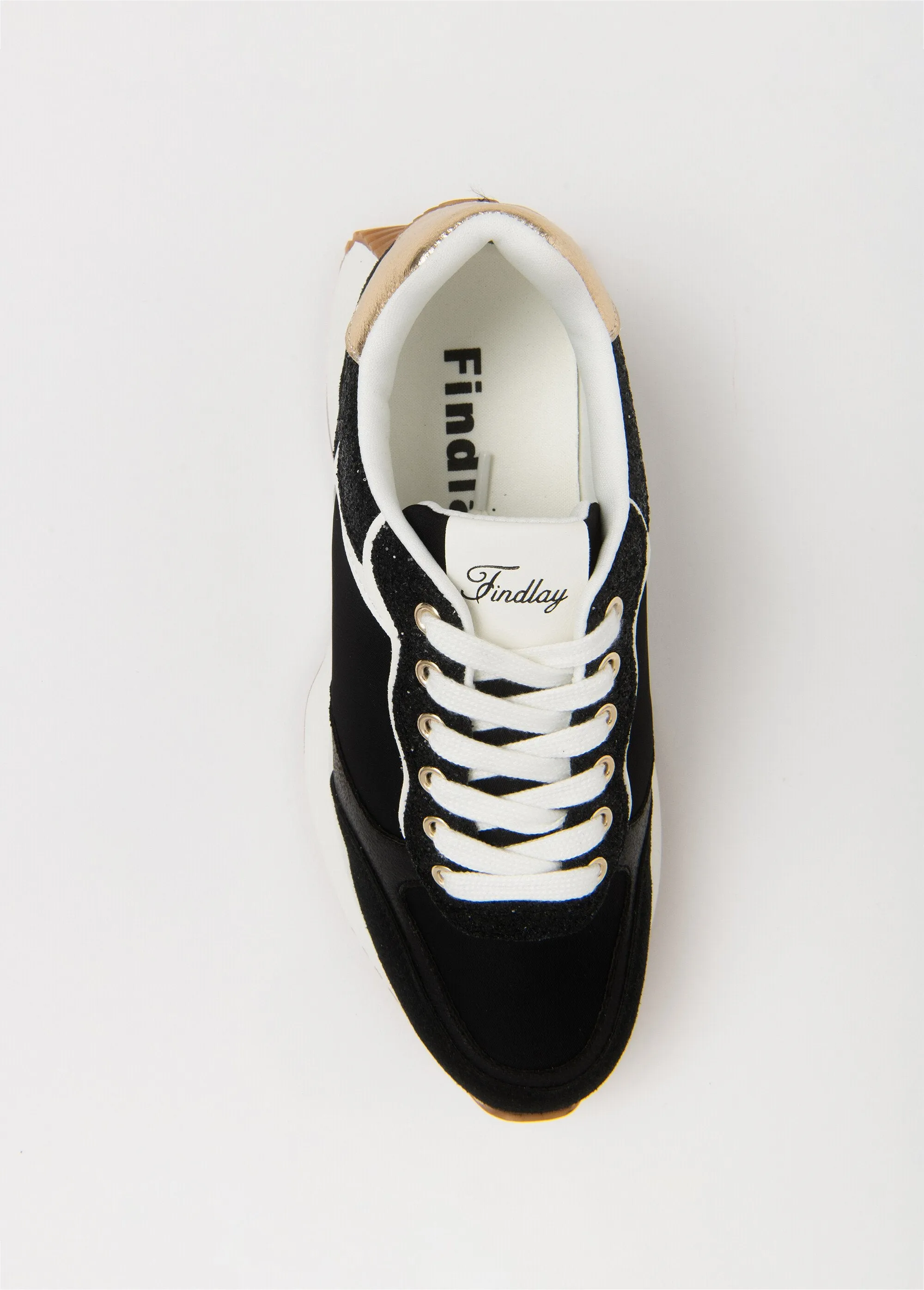 Black sneakers with gold detail and thick sole