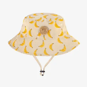 Chapeau de soleil beige en twill à motifs de bananes, enfant || Beige twill sun hat with banana all over print, child