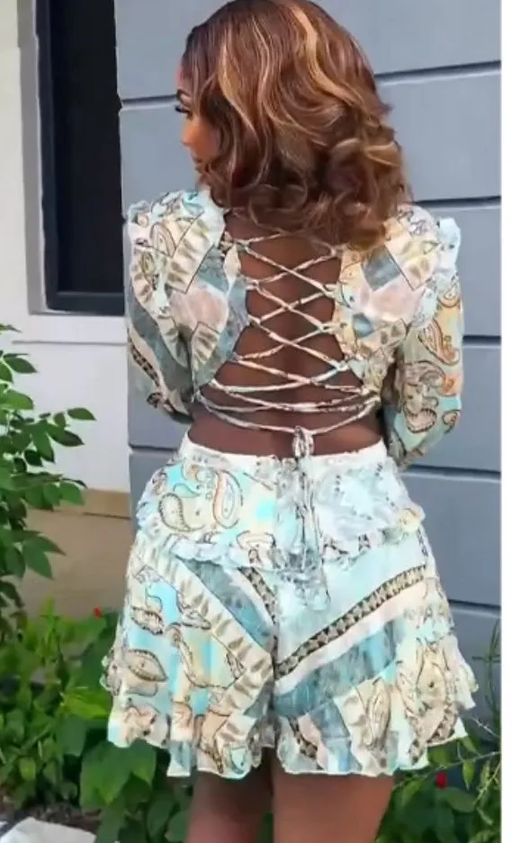 Chic Printed V-Neck Hollow Long-Sleeve Top and Ruffled Skirt Pants Two-Piece Set