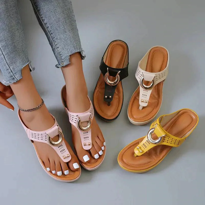 Perforated Leather Wedge Sandals with Metal Embellishment