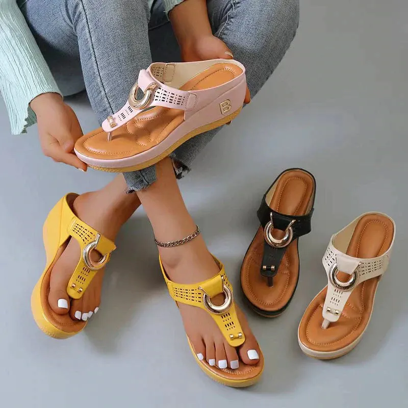 Perforated Leather Wedge Sandals with Metal Embellishment