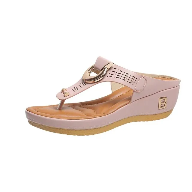 Perforated Leather Wedge Sandals with Metal Embellishment