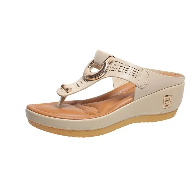 Perforated Leather Wedge Sandals with Metal Embellishment