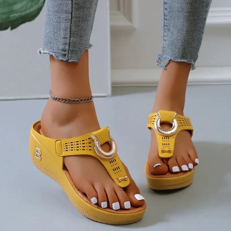 Perforated Leather Wedge Sandals with Metal Embellishment