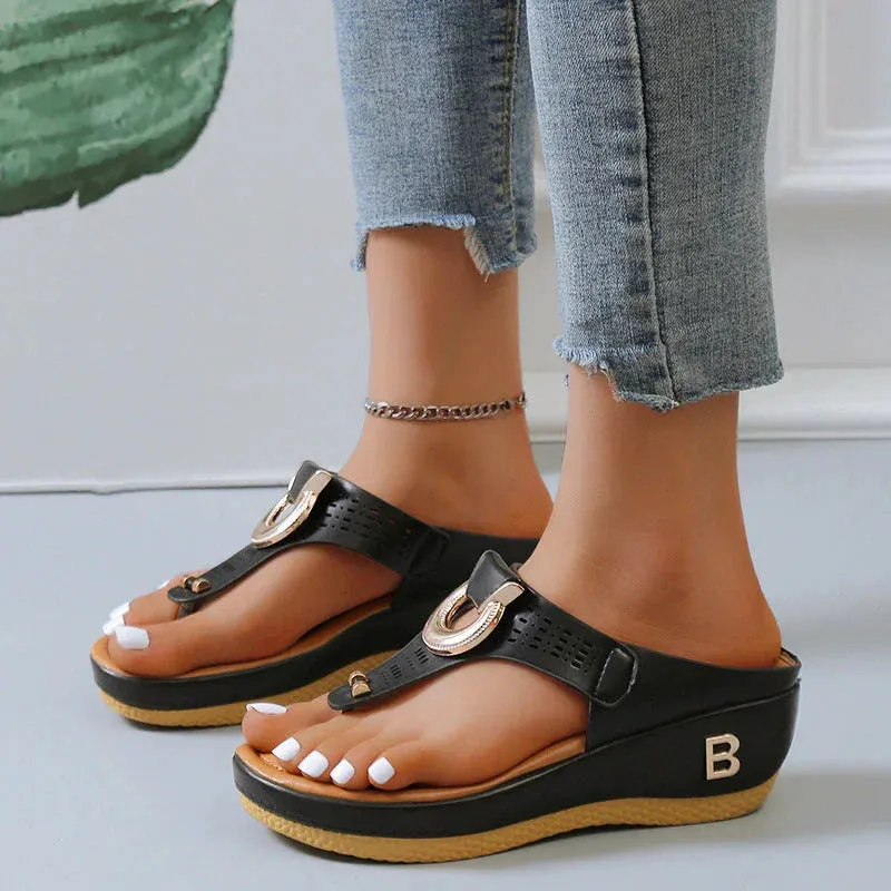 Perforated Leather Wedge Sandals with Metal Embellishment