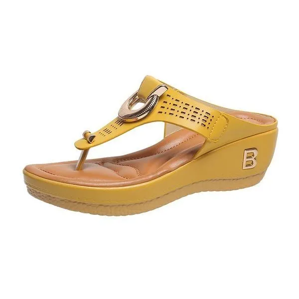 Perforated Leather Wedge Sandals with Metal Embellishment